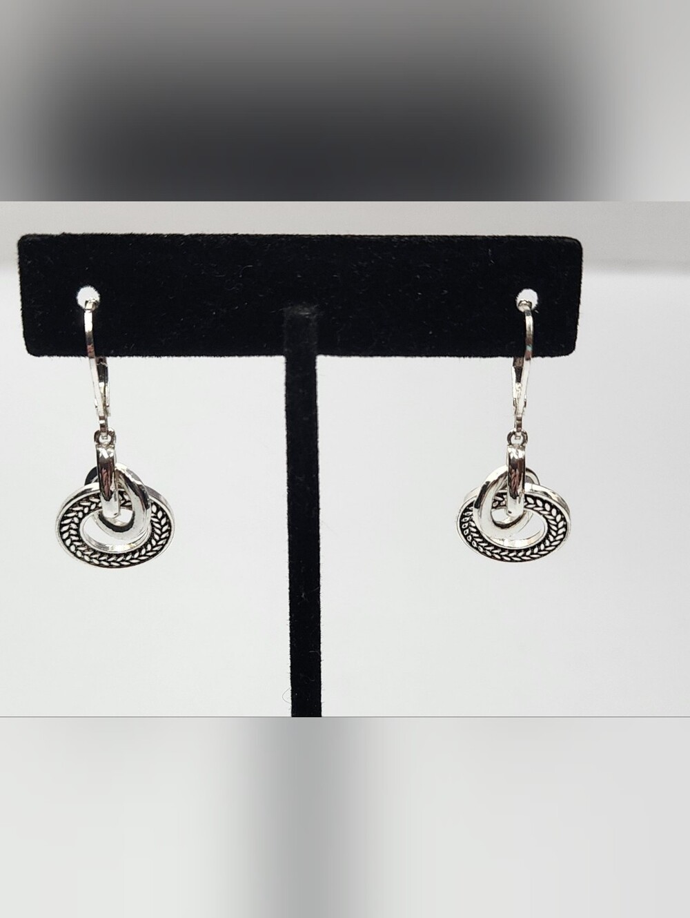 Napier silver dangle earrings Textured Interlocking Multiring Circular Drop
